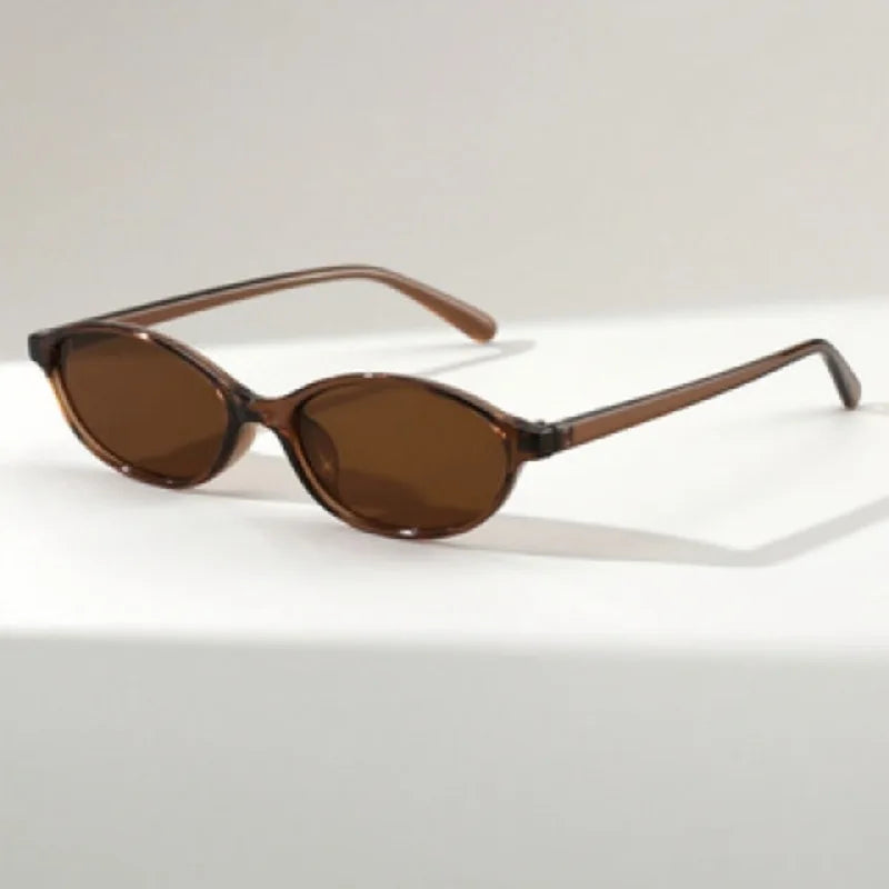 1pcs Minimalist black-rim oval sunglasses, sun protection, fits all face shapes for daily commute.